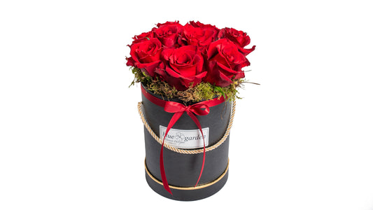 Arrangement Of Fresh Roses with Moss in White/Black Box