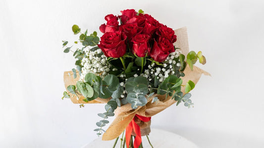 Bouquet Of Fresh Roses and Gypsophila Round